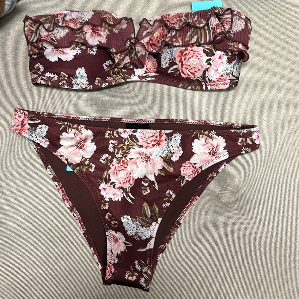 New with tags.  Floral bikini set H&M size 4